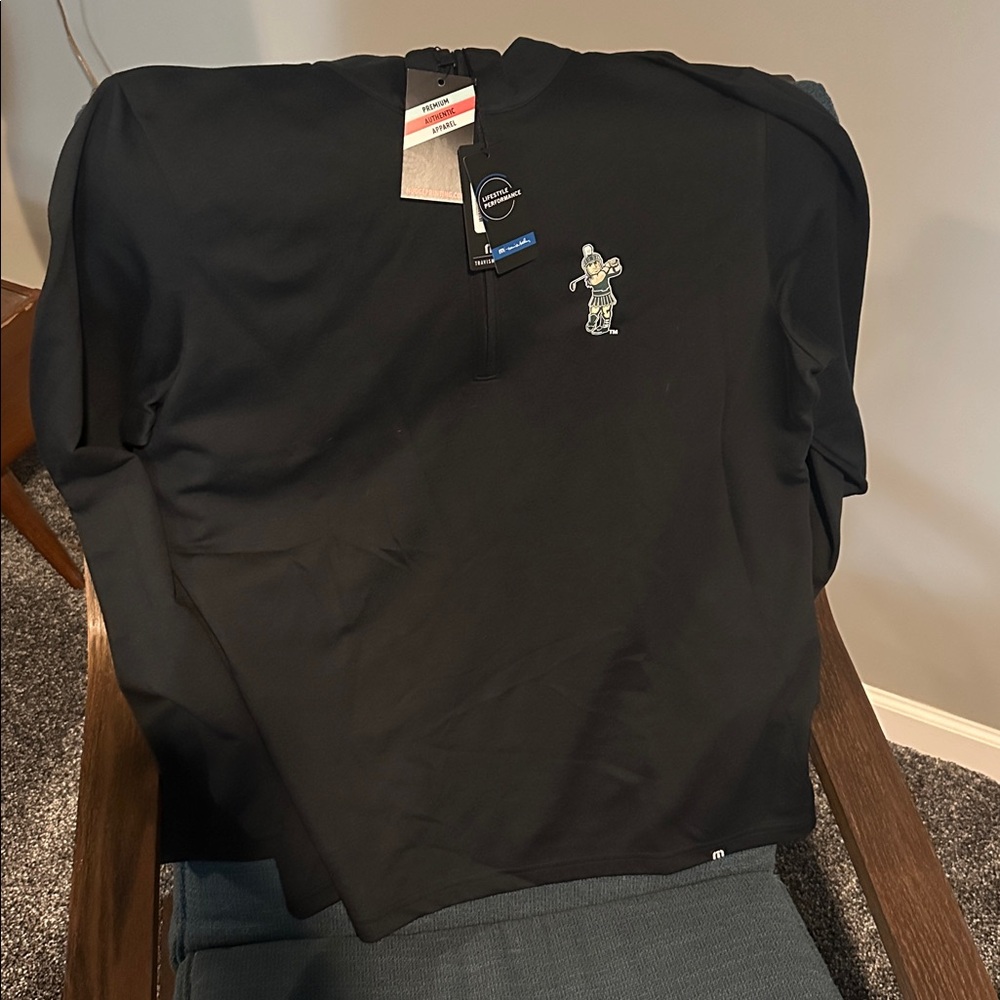 MSU Sparty Travis Mathew Black Long Sleeve with Embroidered Sparty Golfer